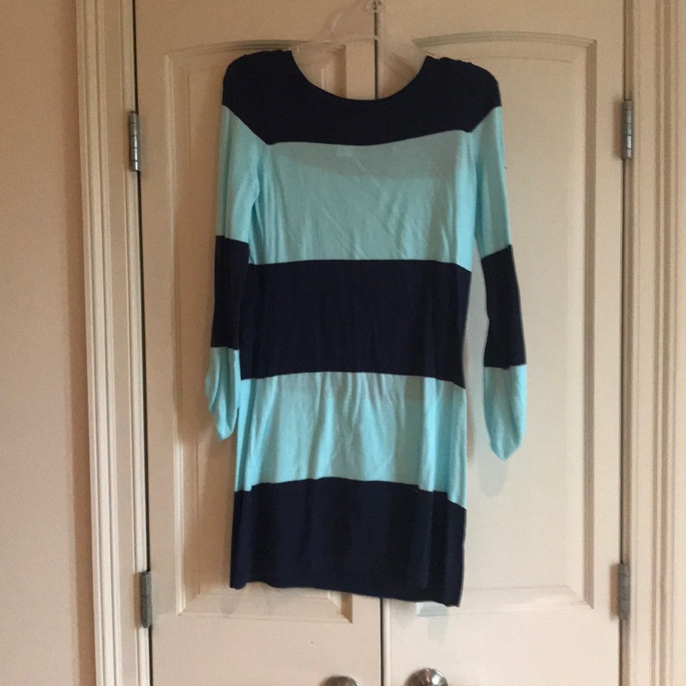 Bathing suit cover with button sleeves